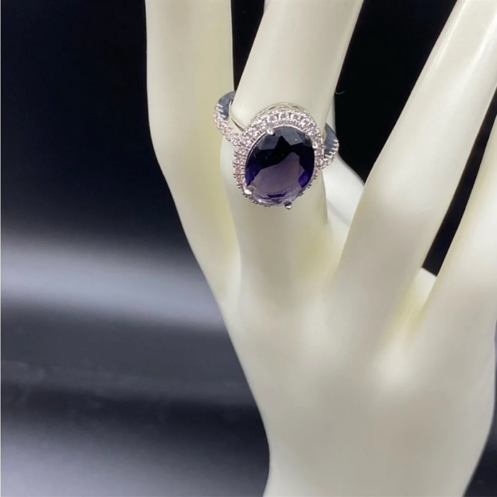 Sterling Silver amethyst prong set cocktail ring with gemstone halo bezel